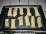 Sausage rolls on a baking tray