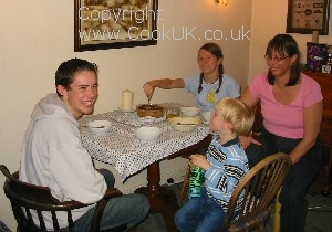Picture of us all enjoying the apple crumble recipe.
