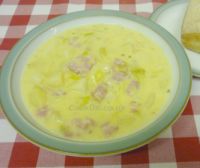 Cooked bacon and cheese soup in a bowl