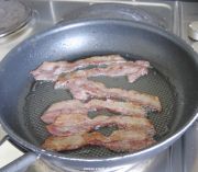 Streaky bacon cooked