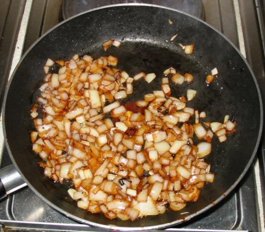 Frying onion for Beef Provencal