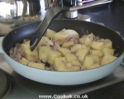 Frying potatoes and onions in butter