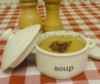 Chestnut and bacon soup served in a bowl