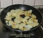Sliced potatoes cooking. Click picture to enlarge.