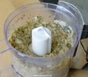 Finely chopping onions and herbs