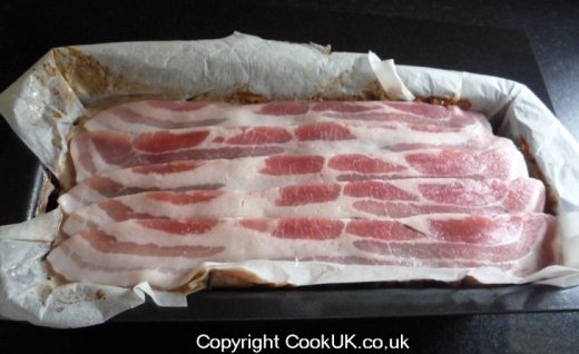 Bacon onto part cooked Neapolitan Meatloaf