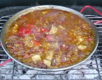 Rice added to paella