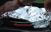 Paella resting covered with foil