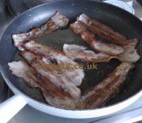 Frying streaky bacon