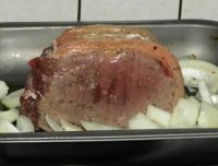 Joint of beef seared in a baking tray