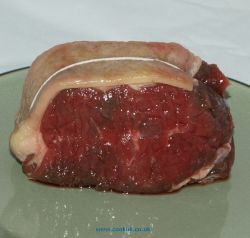 Uncooked sirloin joint of beef