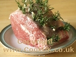 Lamb uncooked with rosemary and garlic
