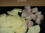 Sliced potatoes and sausage