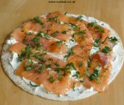 Tortilla covered with cream cheese and smoked salmon