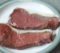 Raw sirloin steak