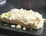 Spread Welsh Rarebit mixture over toast