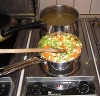 Simmer vegetables in white wine