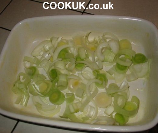 A layer of leeks in the casserole dish