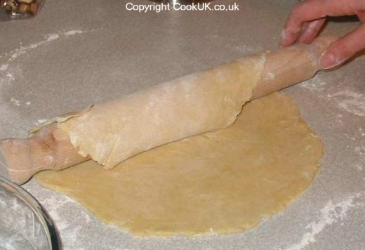 Shortcrust pastry onto rolling pin