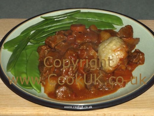 Beef casserole with green beans and dumplings