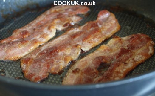 Fried streaky bacon