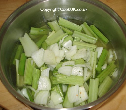 Simmering vegetables in stock