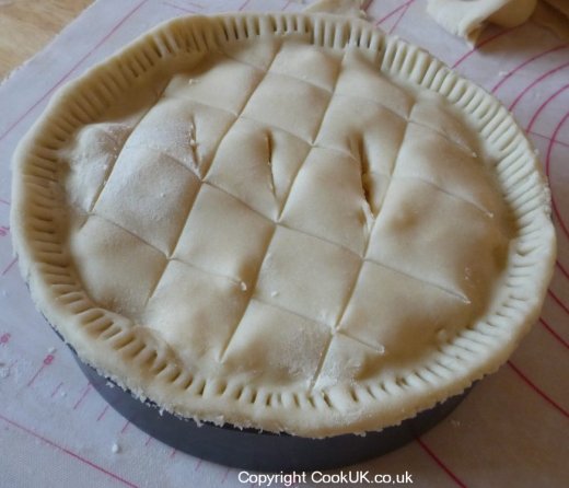 Cheese and onion pie ready for cooking in the oven