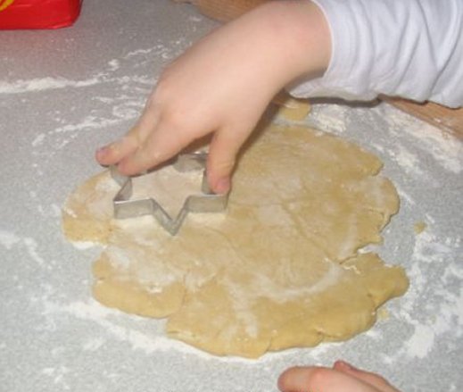 Cutting out shortbread pastry