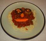 Face vegetable spaghetti bolognaise