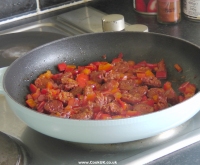 Frying chorizo and sweet red pepper