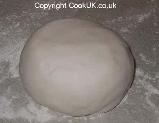 Roll icing into a ball shape