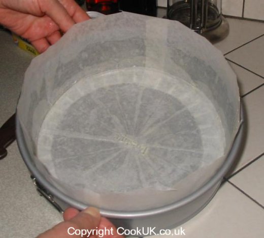 Cake tin fully lined with greaseproof paper