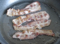 Frying streaky bacon