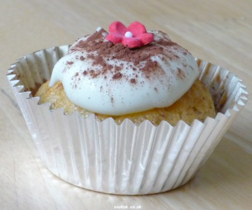 Cup cake, butter icing and chocolate powder