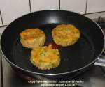 Cooking fish cakes. Click picture to enlarge.