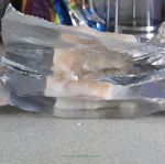 Fish fillets separated by foil