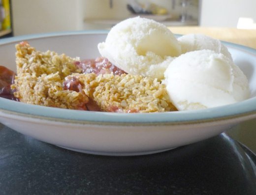 Gooseberry crumble served with ice cream