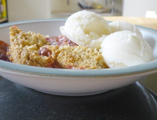 Gooseberry crumble served with ice cream