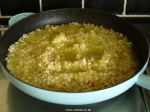 Arborio rice cooking in the pan