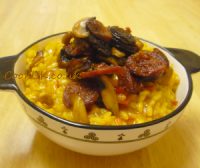 Chorizo and mushroom risotto served in a bowl.