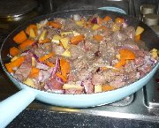 Frying beef stew ingredients