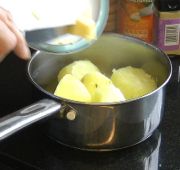 Add butter to mashed potato