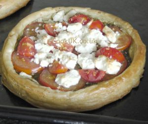 Cooked tomato and feta cheese tart